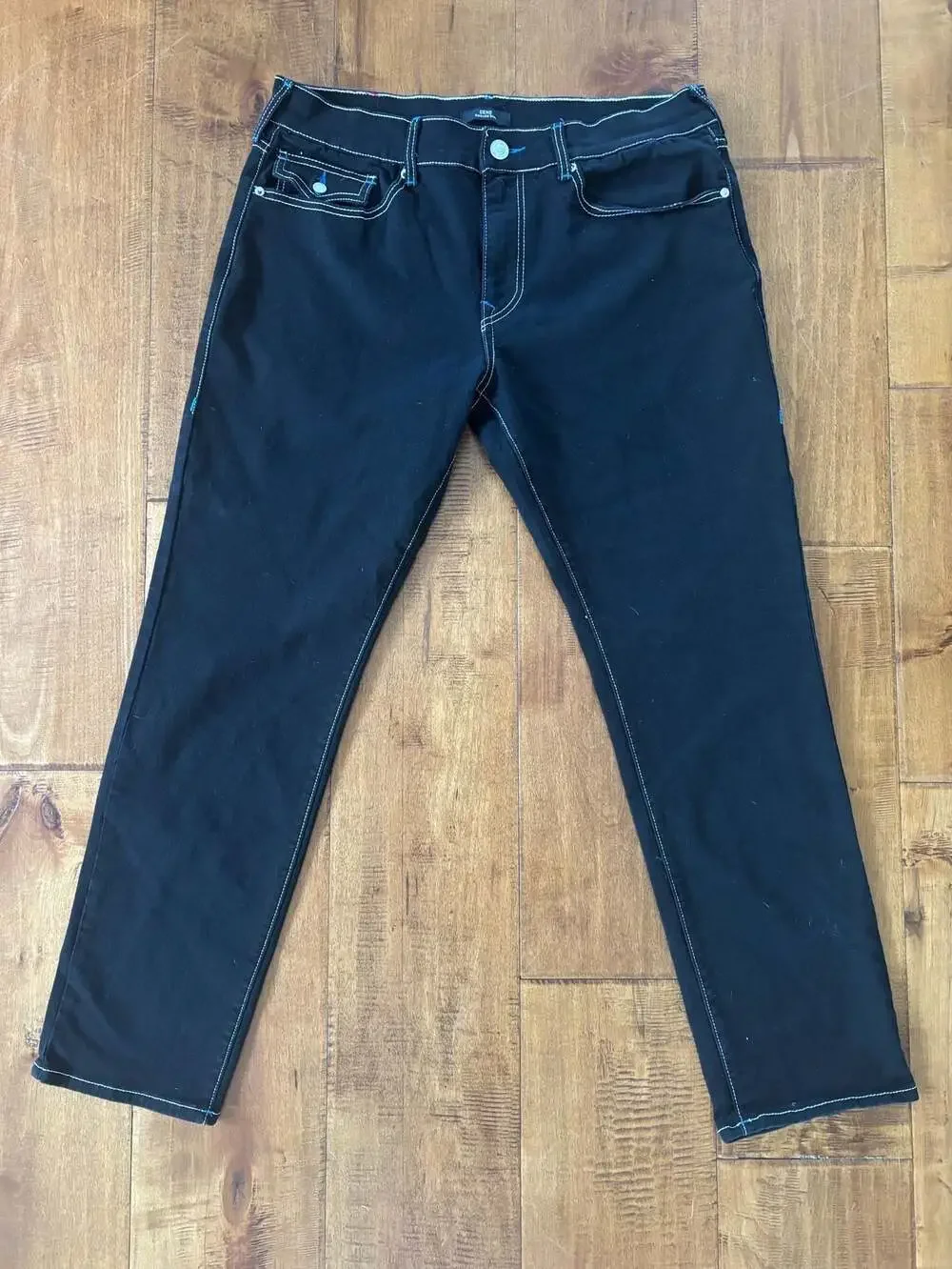 True Religion Geno Relaxed Slim Jeans in Black with Contrast Stitching